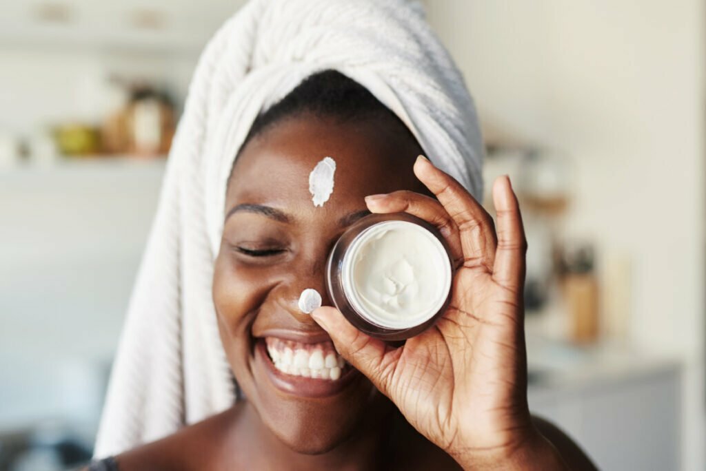 Young Happy Woman Enjoys Skincare Essentials from The Swan Center in Atlanta