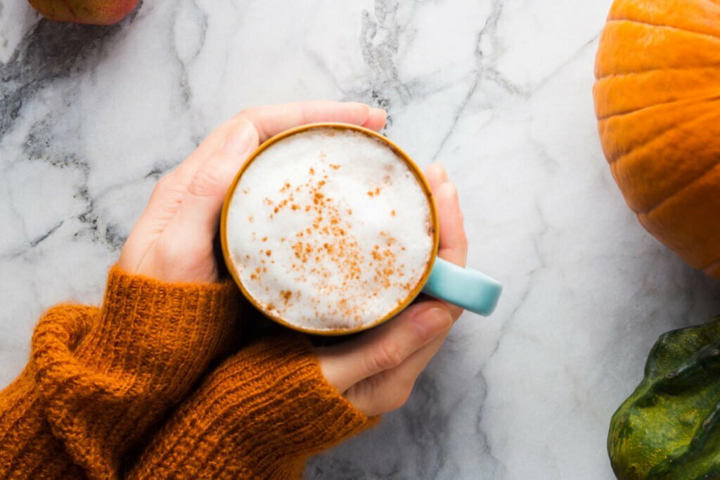 Woman Sipping Pumpkin Spice in the Fall